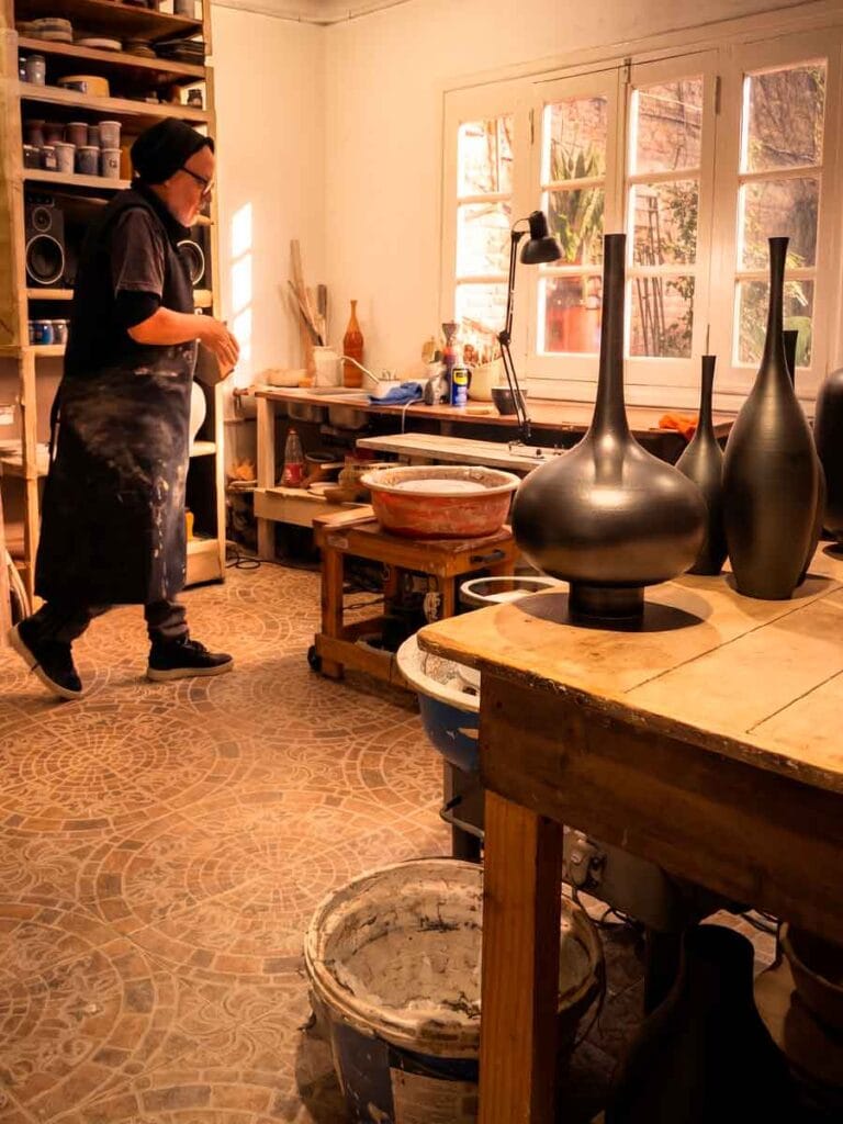 Studio pottery workshop — Fernando Durao's Buenos Aires studio, wheel, shelves and kiln