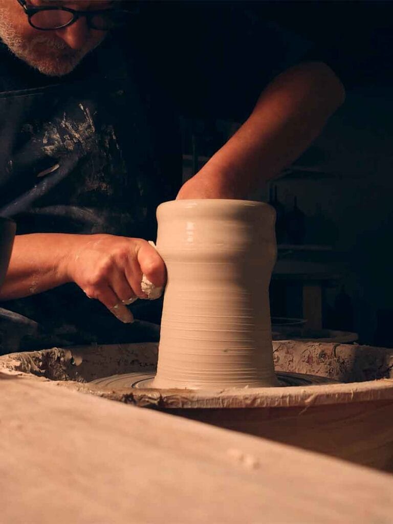 Studio pottery artist Fernando Durao at the wheel in his Buenos Aires studio — 35 years of practice