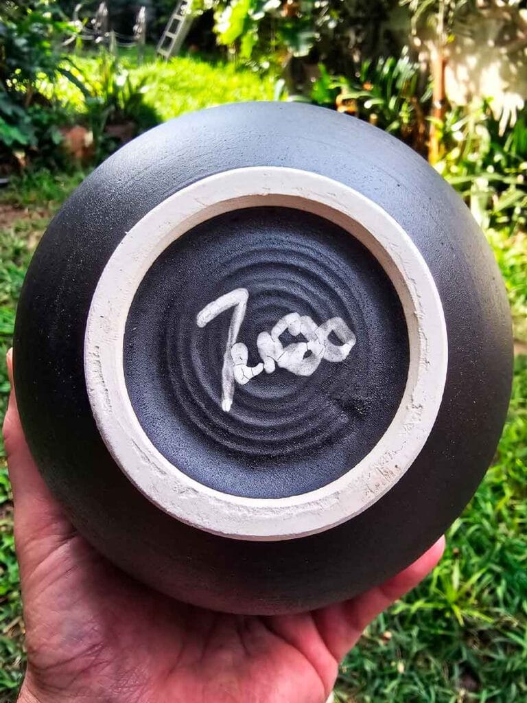 Vitrified stoneware surface after firing at 1200°C — mineral slip ceramic art by Fernando Durao