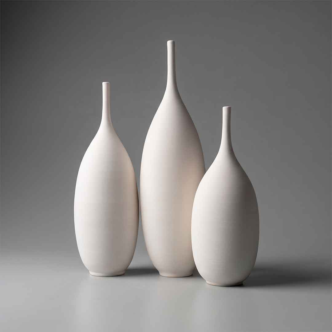White ceramic vase rounded body slender neck — handmade studio pottery by Fernando Durao